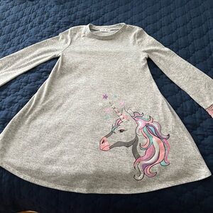 Girls dress with unicorn designs on the bottom long sleeves with pink design